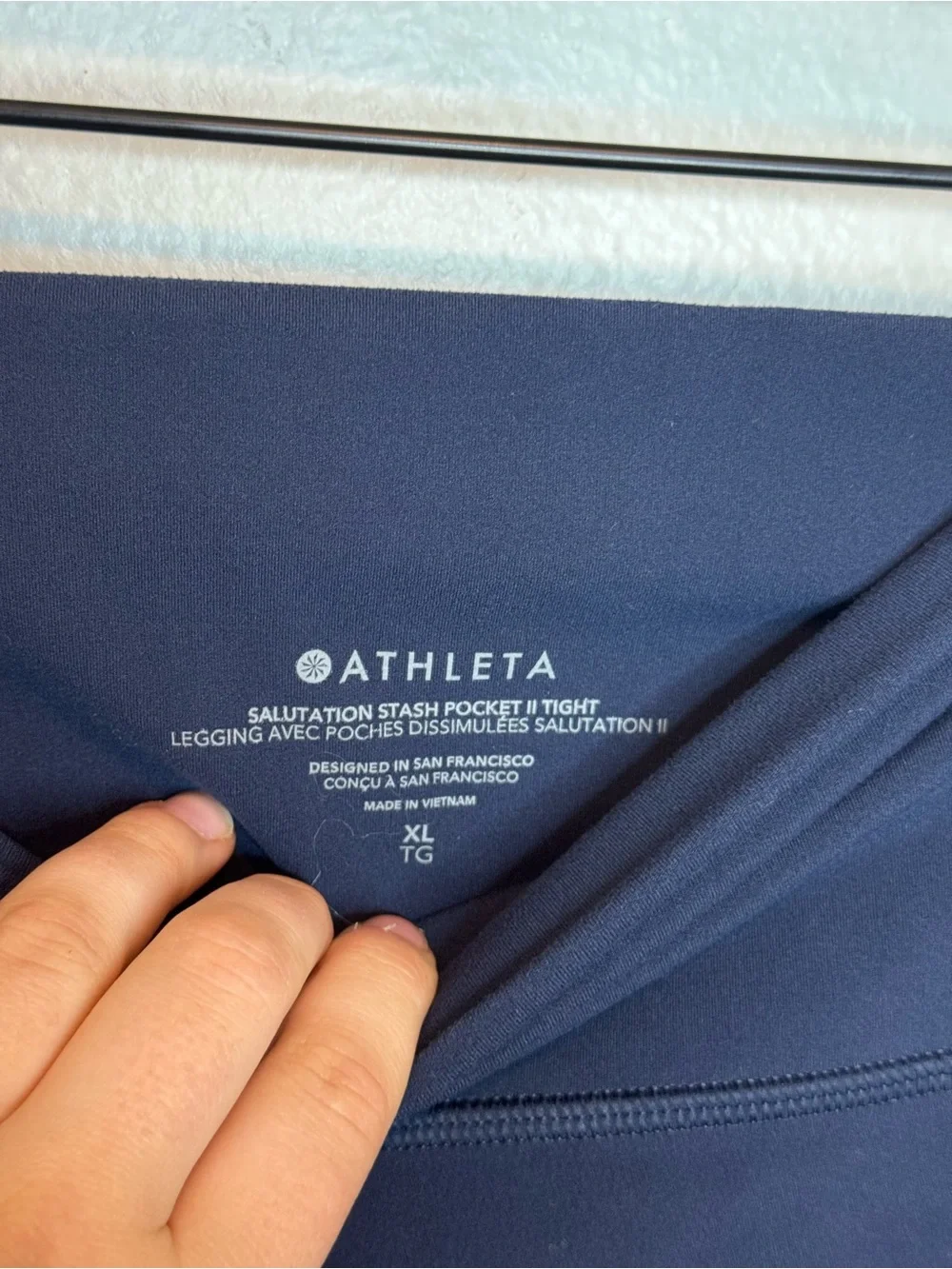 Athleta Salutation Stash II High Rise Legging Navy Blue pocket